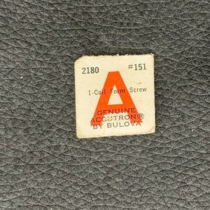 NOS Genuine Accutron by Bulova Watch Part.  A 2180 #151.  Coil Form Screw
